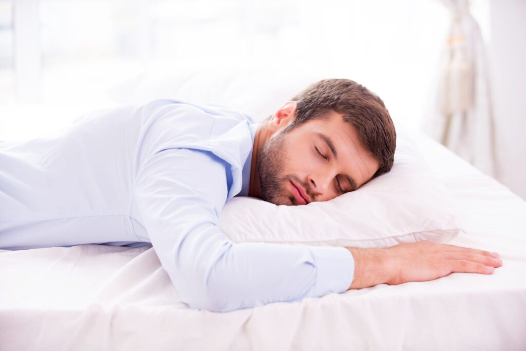 Healthy Lifestyle: Now or Never? 5 vecteezy tired and overworked handsome young man in shirt sleeping 13497870