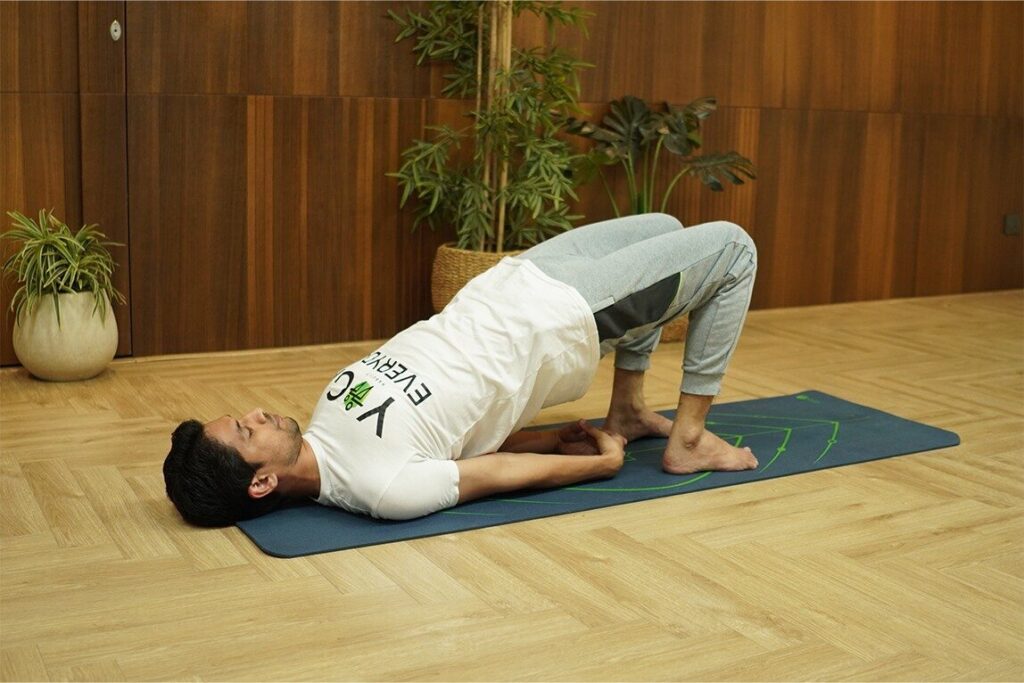 Yoga to support postpartum health 5 supported bridge