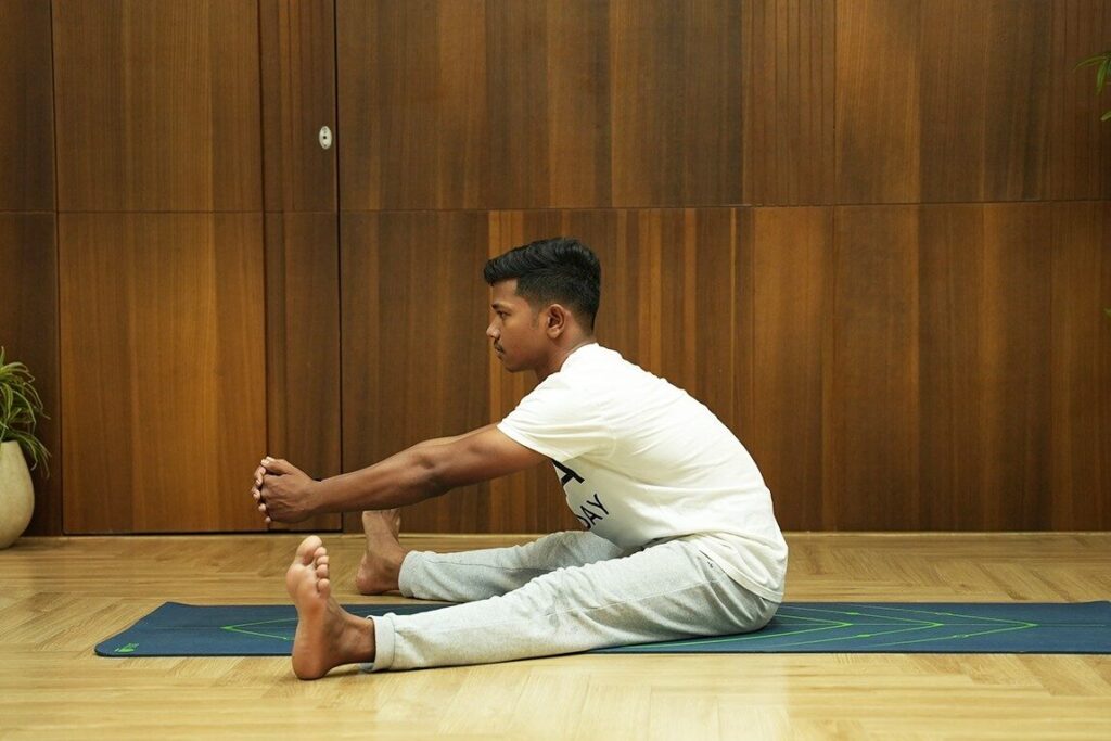 10 Effective Yoga Asanas for PCOD 8 Chakki Chalanasana