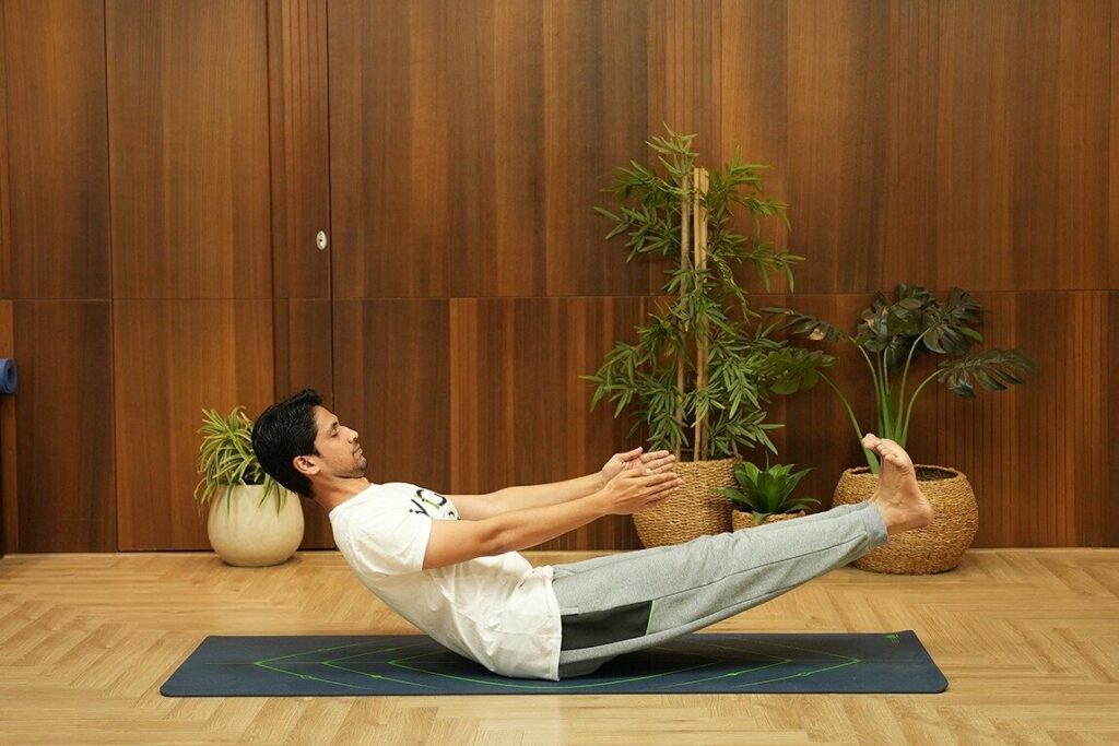 10 Effective Yoga Asanas for PCOD 13 Navasana Boat Pose