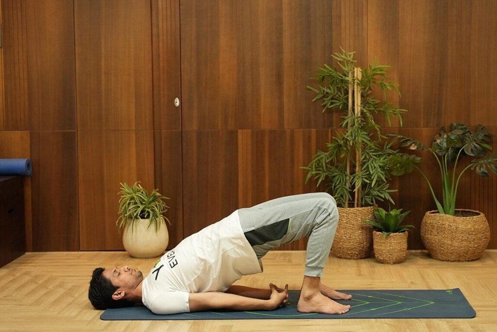 10 Effective Yoga Asanas for PCOD 12 setu bandhasana