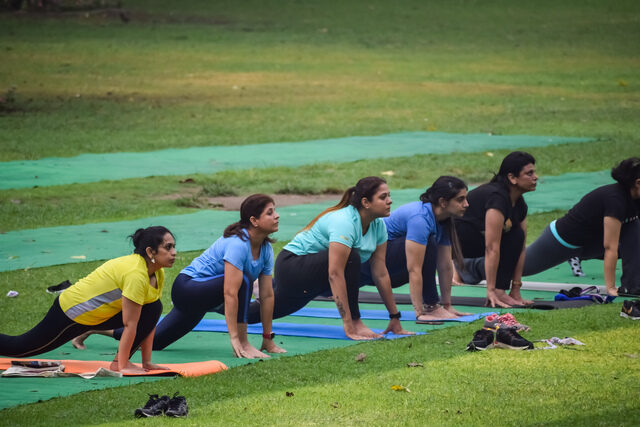 Learn How to Be Consistent in Life: 10 Easy Steps to Stay Consistent 3 small vecteezy new delhi india may 31 2023 group yoga exercise class 25876492 small