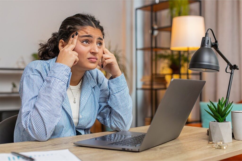 Yoga for Hormonal Balance in Women: PCOS, Menopause & Thyroid Support 1 Women is confused in her mind dealing with so many things at once like relationship job stress self care