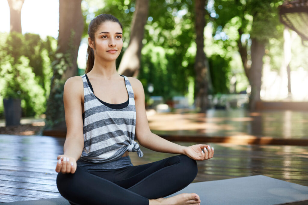 Vitamin B12 and D Deficiency: Symptoms, Causes, and Recovery Tips 4 Young lady doing yoga to maintain her Vitamin B12 levels.