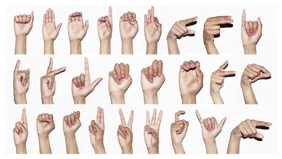Close-up of hands forming a hasta mudra gesture