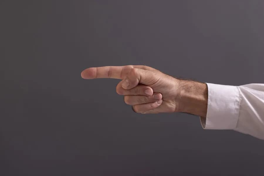 Hand gesture illustrating Vajra Mudra, the thunderbolt yoga hand mudra