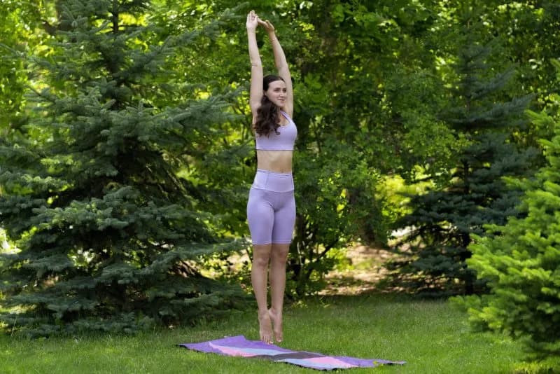 a young fit woman jump in the air outdoors on a gr 2026 03 17 20 18 18 utc
