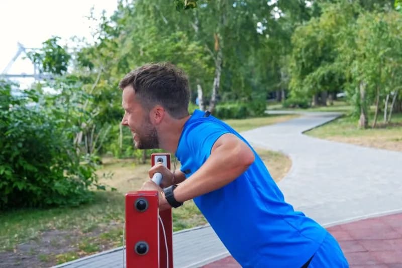 athletic man in blue sportswear doing push ups fro 2026 04 14 05 19 25 utc