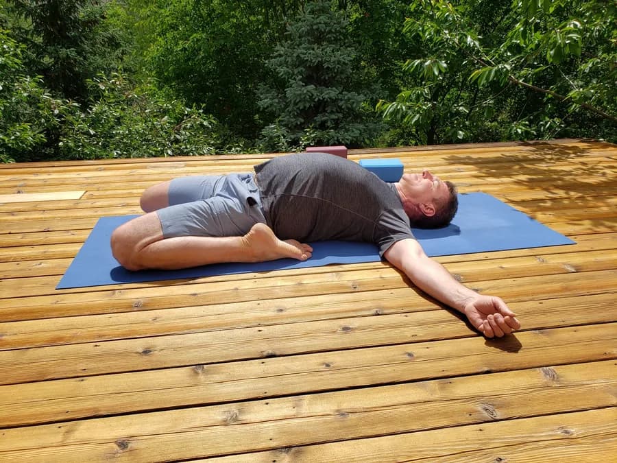 Senior man exercising outdoors as part of a daily fitness routine