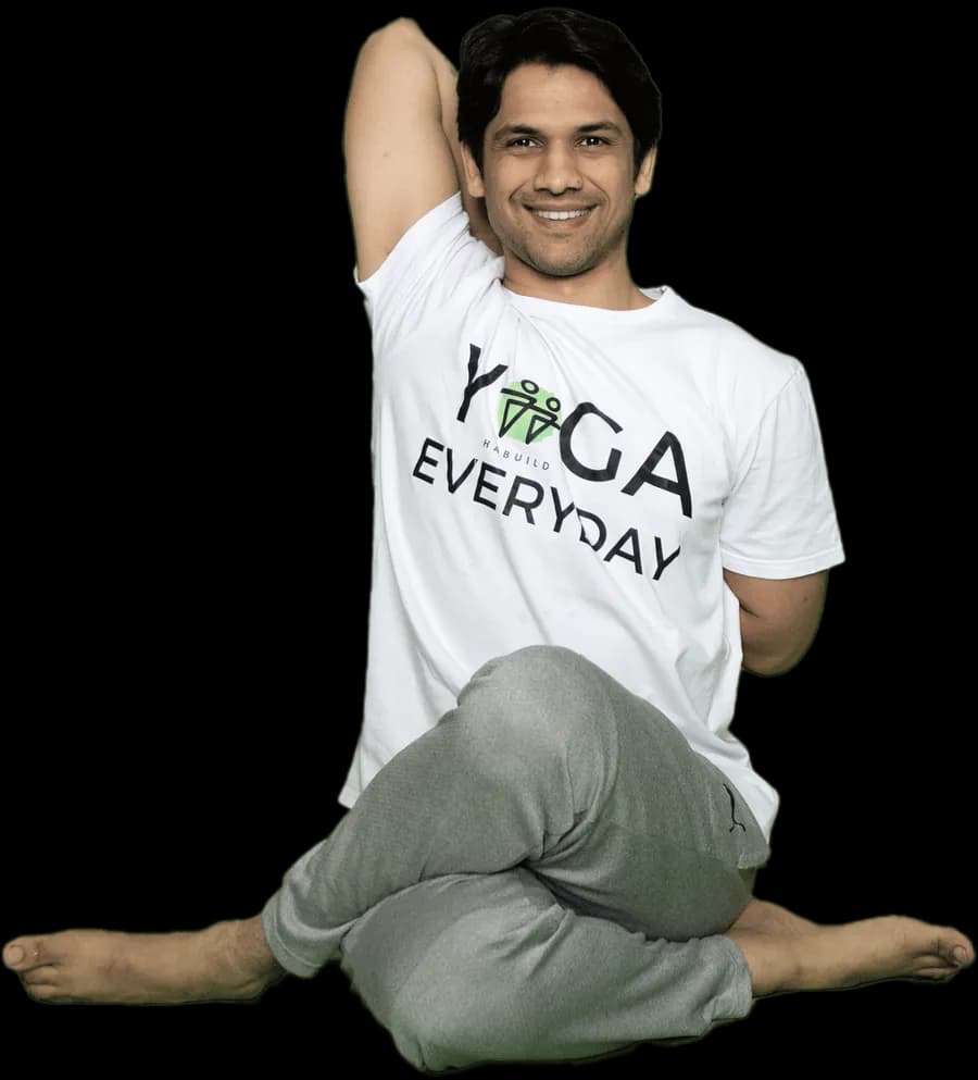 Office worker doing a desk stretching exercise to relieve neck and shoulder stiffness