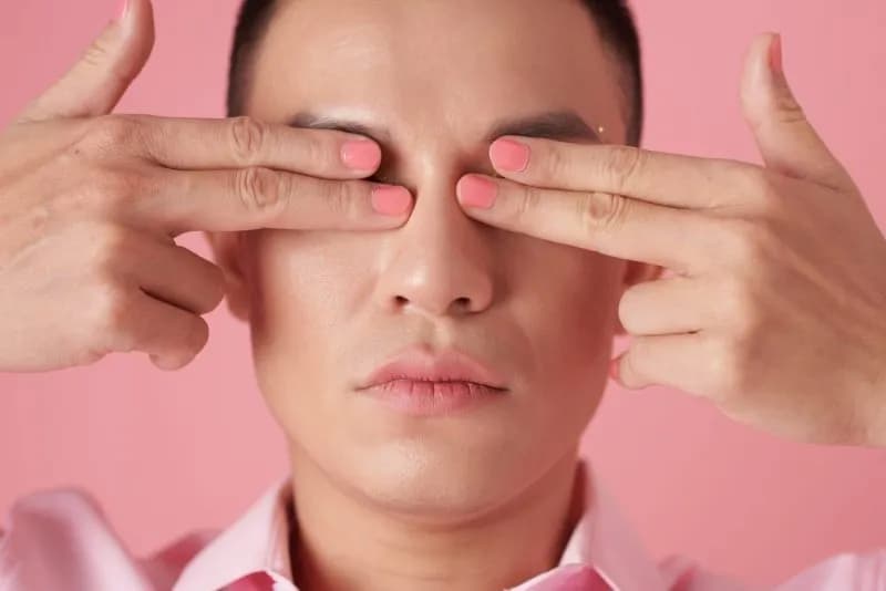 face-close-up-with-fingers-on-eyelids-2026-03-27-00-36-26-utc.jpg