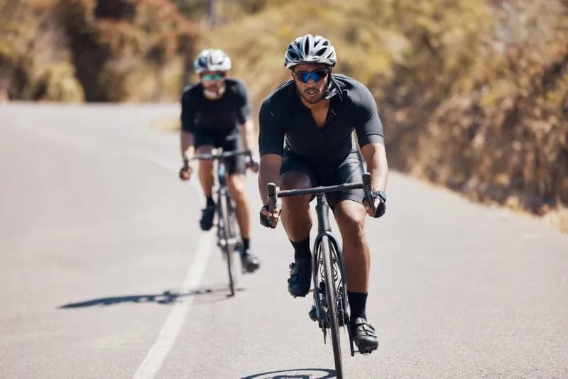 fitness-man-cycling-bike-on-mountain-road-for-card-2026-01-09-09-26-07-utc.jpg