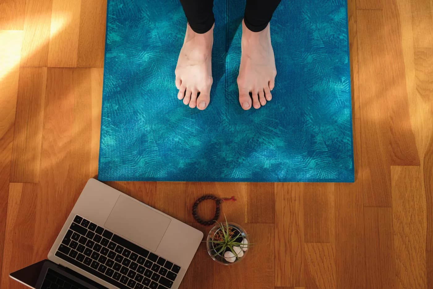 Close-up of feet on a yoga mat during foot exercises for flat feet