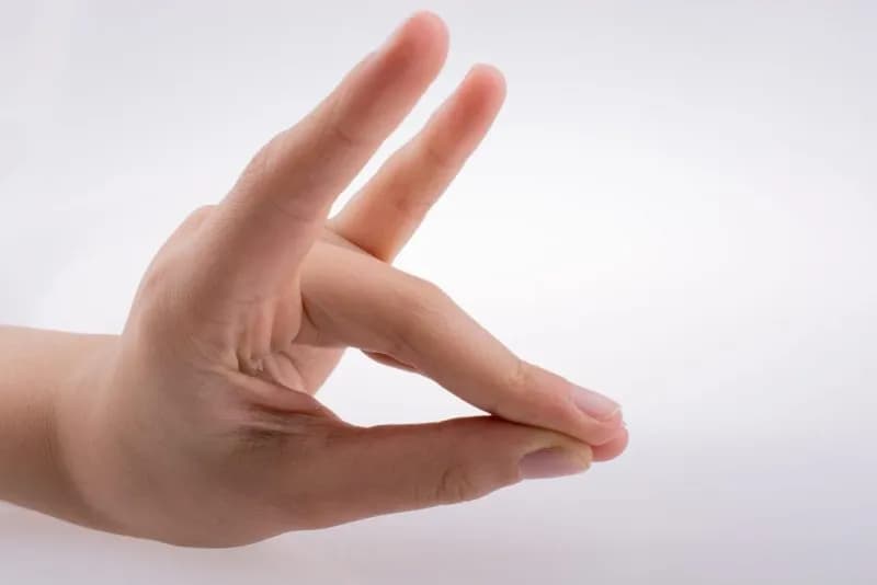 hand gesture isolated on white studio background 2026 03 26 04 00 29 utc