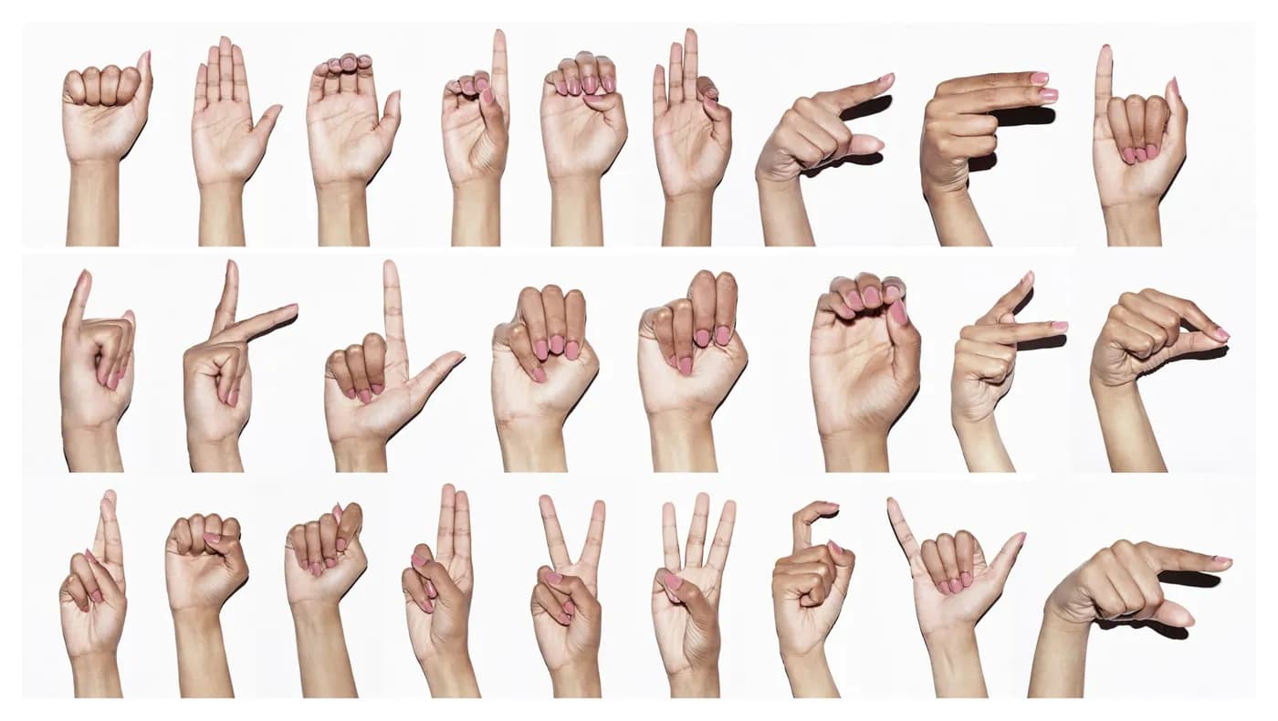 Close-up of hands forming a hasta mudra gesture