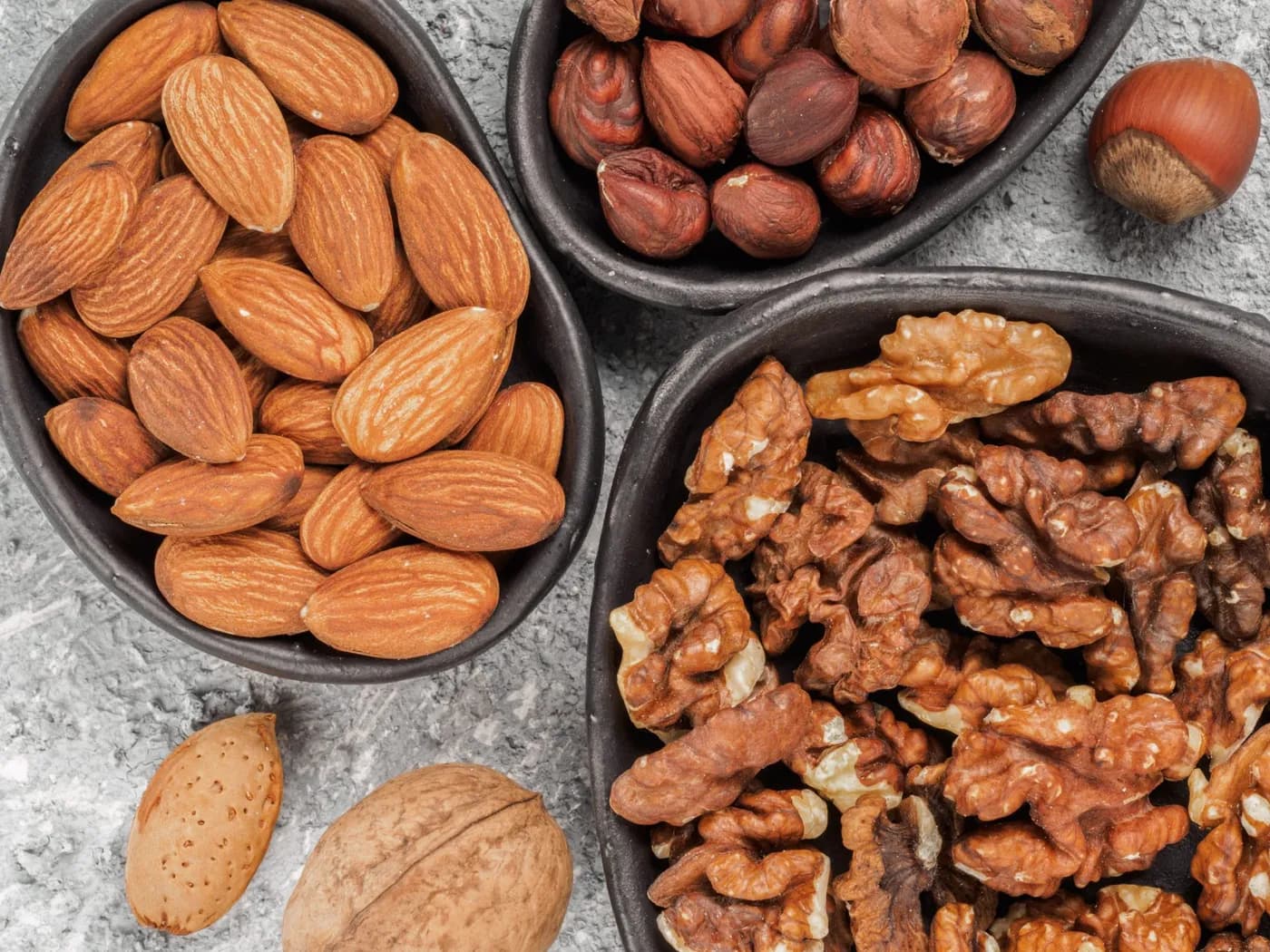 Healthy fats for brain: soaked almonds and walnuts habit