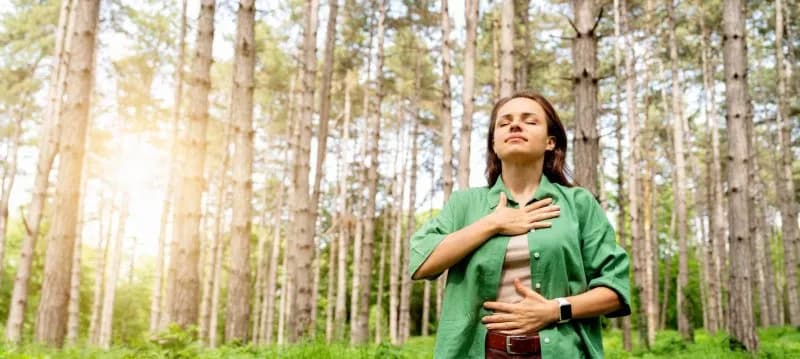 healthy woman standing in forest and practising br 2026 03 25 23 54 40 utc