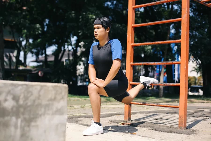 Person performing a knee push-up with correct form