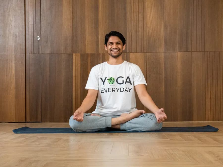 Yoga practitioner seated in a calm pose during a pranayama breathing practice