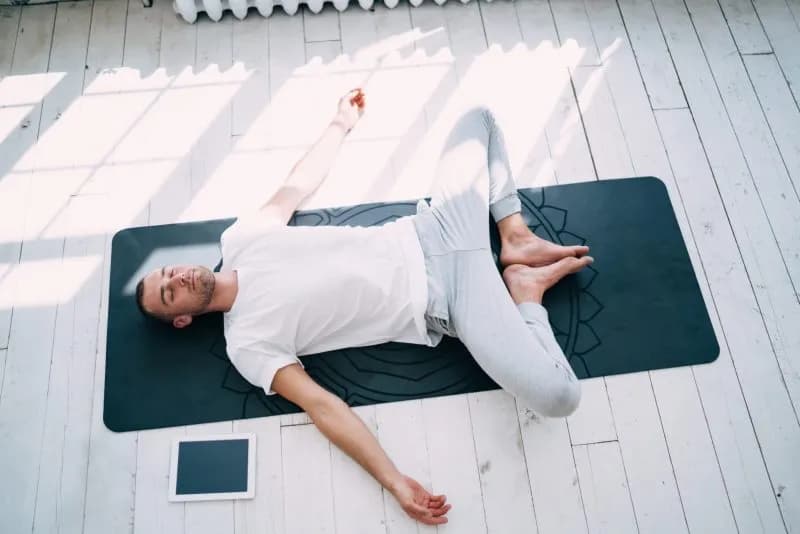 relaxed man practicing reclining bound angle asana 2025 12 31 02 21 53 utc 1