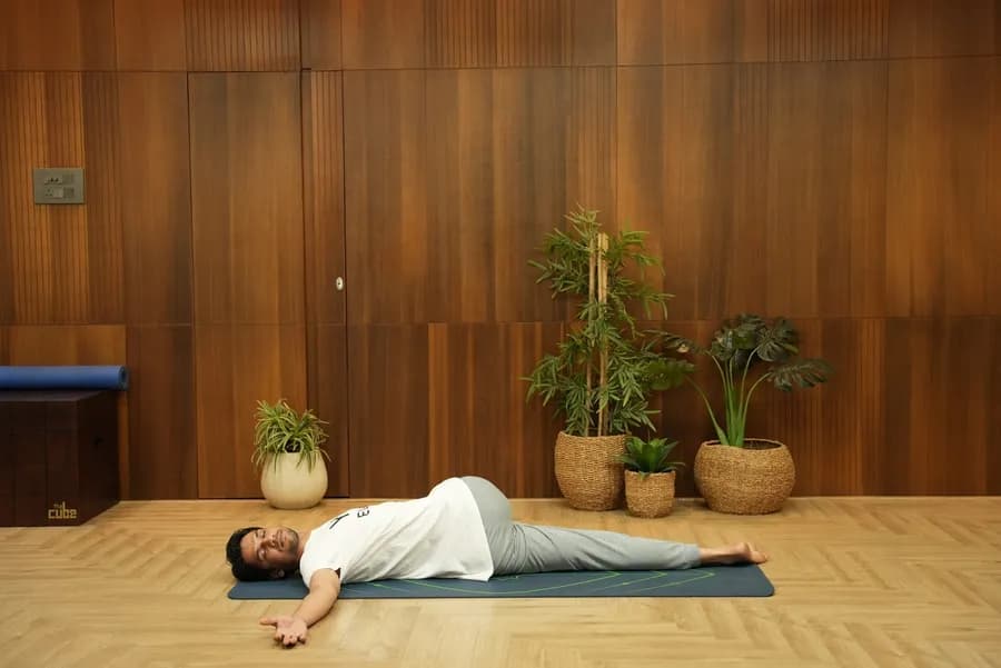 Supta Matsyendrasana (Supine Spinal Twist) — reclined spinal twist yoga pose demonstration