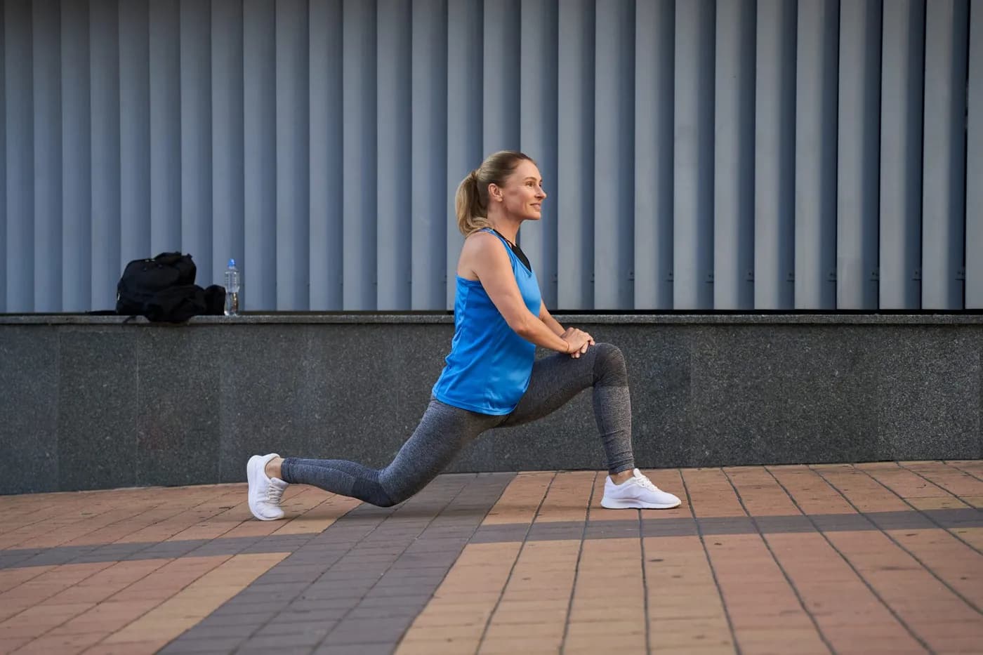 Woman doing lunges workout to reduce thigh fat