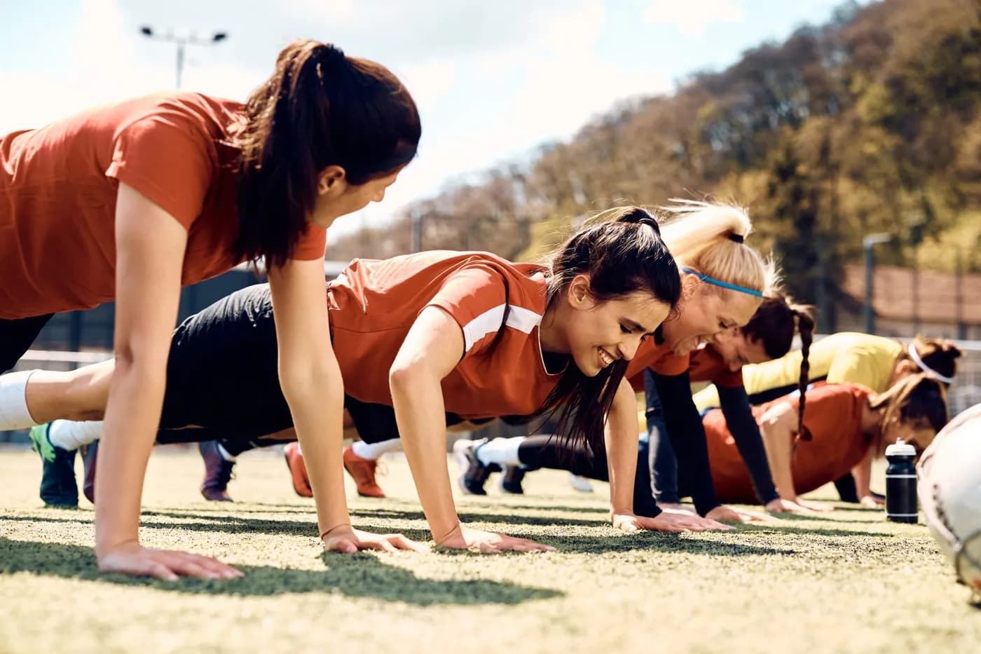 Person performing a burpee exercise