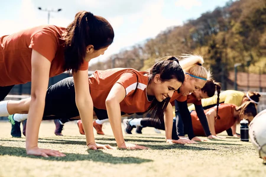 Person performing a burpee exercise