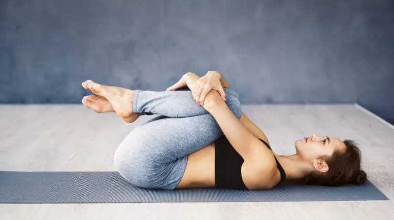 woman stretching on a yoga mat at home 2026 01 08 23 11 40 utc 2