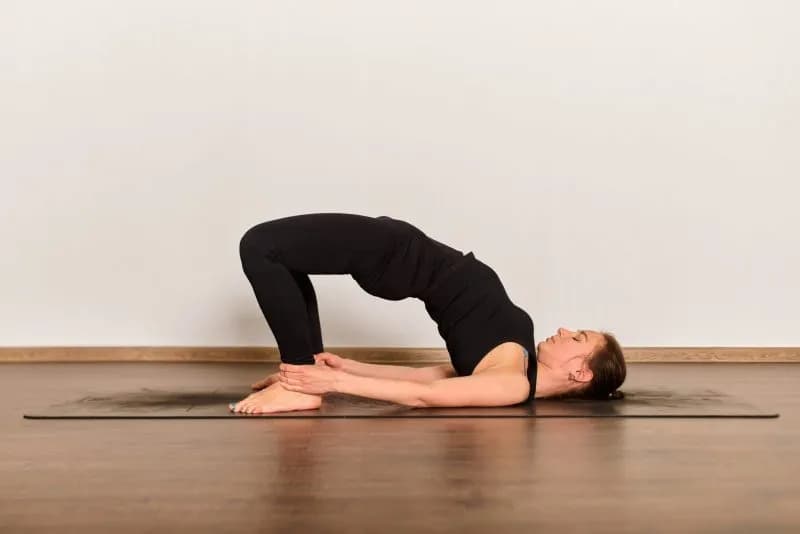 yoga bridge pose in calm studio setting 2026 01 09 11 40 05 utc 1 2