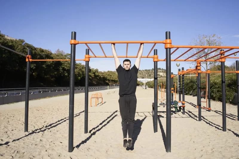 young-man-in-a-barbell-park-doing-pull-up-calisth-2026-03-17-05-05-06-utc.jpg